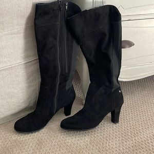 Tall black suede boots